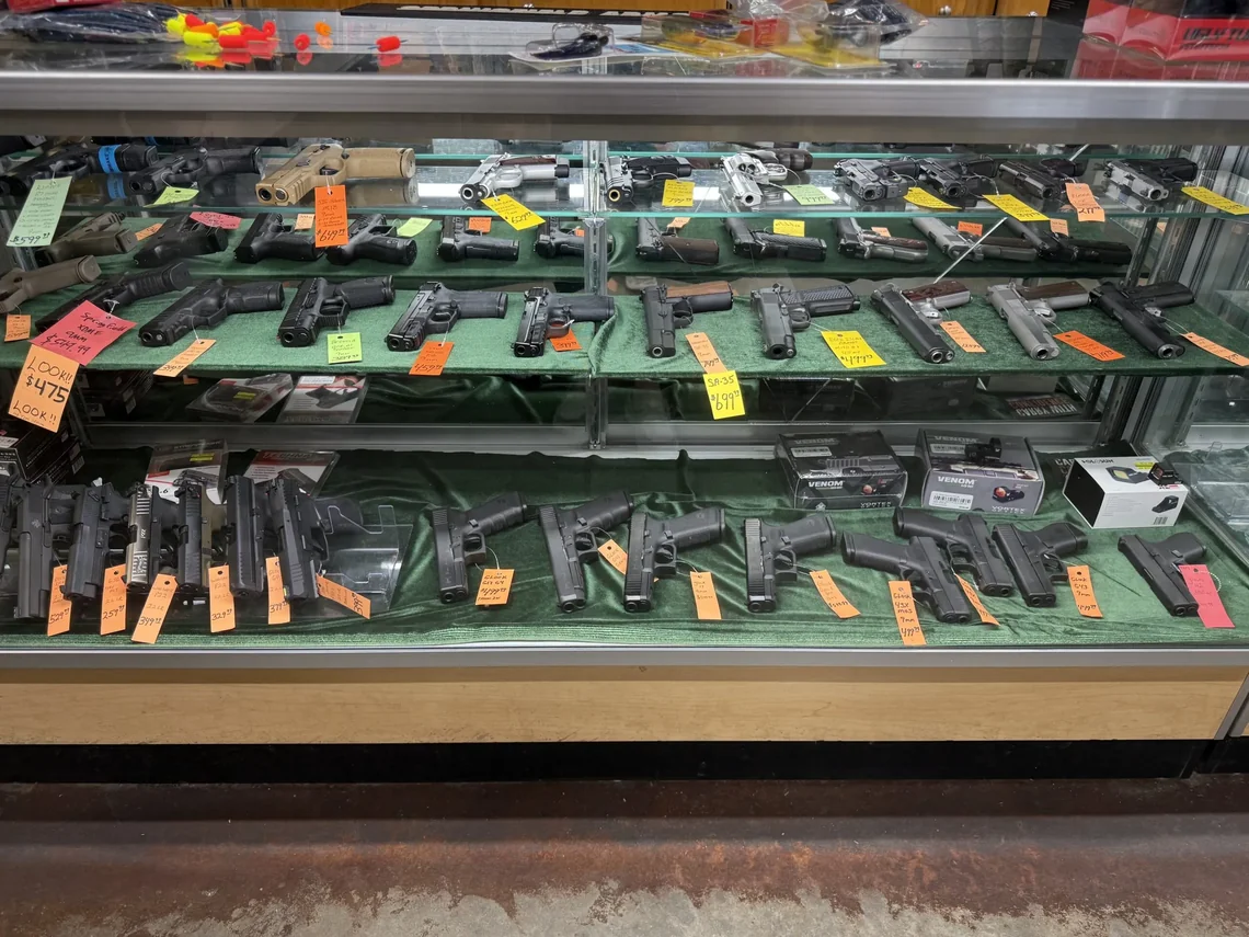 Pistol display case at Irby Street Sporting Goods gun shop, Florence SC